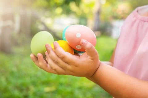 Child holding Easter eggs Stock Photos