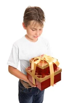 Child holding stack of presents Stock Photos