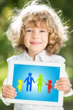 Child holding tablet pc Stock Photos