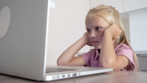 Child at home at the computer Video stock 138952124