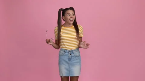 Child indicate empty space thumb up fists up isolated pastel color background Stock Footage 166953238