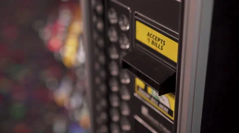 Child inserting dollar bill into vending machine 4k 스톡 동영상 62302751