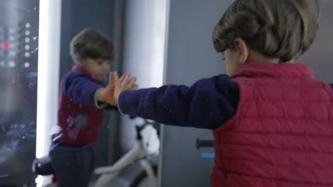 Child inside elevator with bicycle pressing button. Domestic lifestyle of s.. Stock Footage 236859261