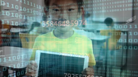 Child inspecting tablet screen and raising head in class, binary overlay Video stock 312361399
