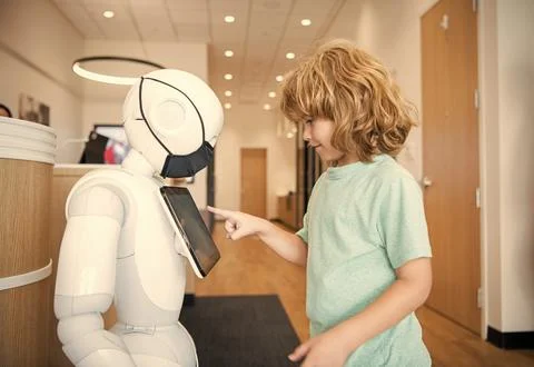 Child interact with cyborg artificial intelligence, communication Stock Photos