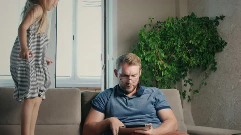 The child interferes with work Stock Footage 132025857