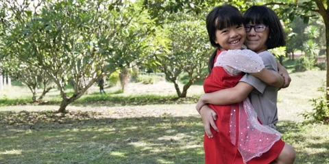 Child jumping hugging Stock Footage 162114479