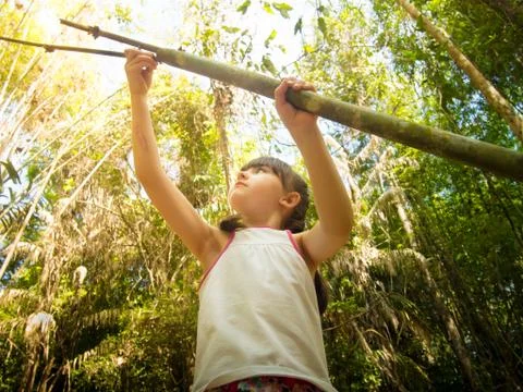 Child in the jungle Stock Photos