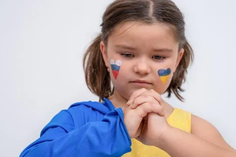 Child keeps hands together unity Stock Photos