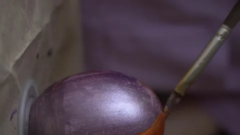 Child in the kitchen painting Easter eggs Stock Footage 271343144