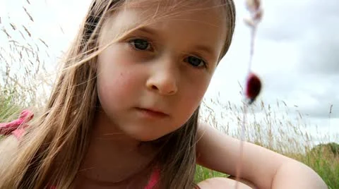 Child with ladybird Stock Footage 22664038