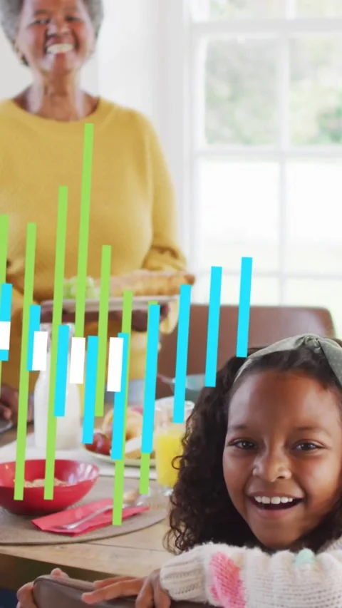 Child laughing, gran serving meal, frames starting ad bars sweeping, obscuring Stock Footage 334382439