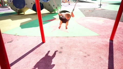 Child laughs and smiles while playing in the city park, happy little child Stock Footage 280871845