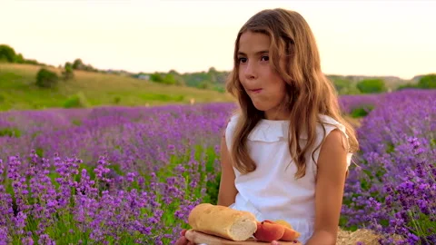 A child in a lavender field. Selective focus. Stock Footage 166438700