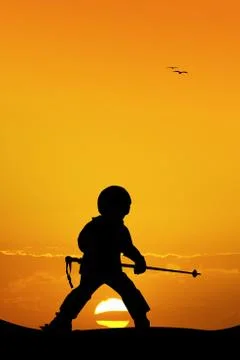 Child learn to ski at sunset Stock Illustration