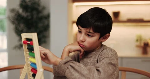 Child, learning and count in home with abacus, practice math and homework for Stockbeeldmateriaal 338223184