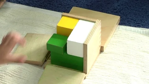 A child learning with building blocks in a Montessori School Class  Stock Footage 83223902