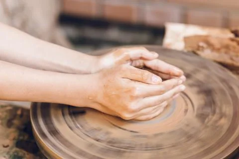 Child learning clay modeling Stock Photos