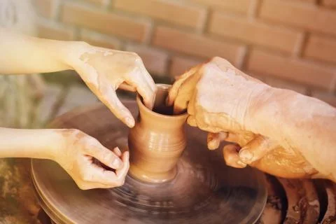 Child learning clay modeling Stock Photos