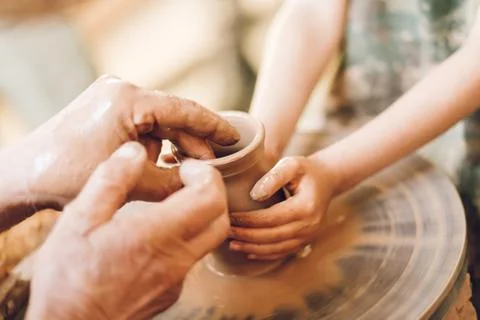 Child learning clay modeling Stock Photos