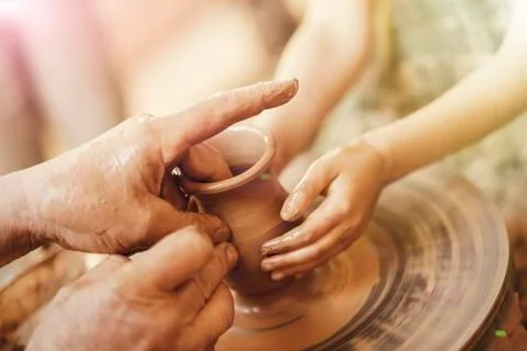 Child learning clay modeling Stock Photos