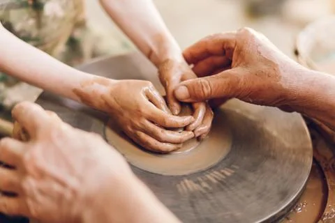 Child learning clay modeling Stock Photos