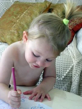 Child learning to draw Stock Photos