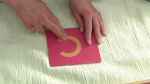 A child learning how to letter trace in a Montessori School Class  Video stock 83224840