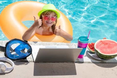 Child learning online computer laptop. Child relax and rest on colorful Stock Photos