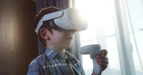 Child learning using virtual reality headset. Modern education a little boy in Stock Footage 248994274