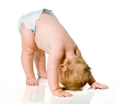 Child learning to walk Stock Photos