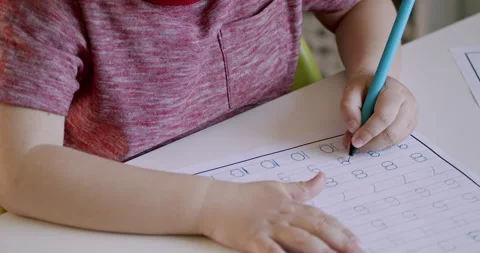 Child learning to write numbers. Stock Footage 133497647