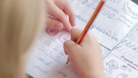 Child learning to write words Stock Footage 157883254