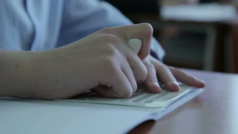 A child learns and writes braille at school 5 Stock Footage 268283574