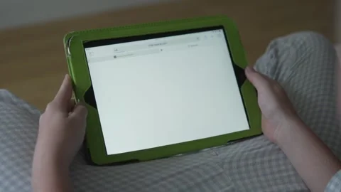 The child learns artificial intelligence on a tablet. Close-up of a GPT chat Video stock 244108772