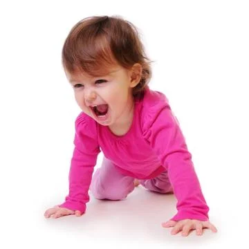 Child learns to crawl Stock Photos