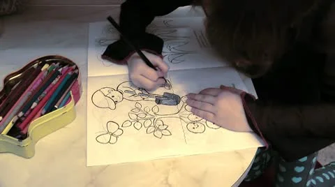 The child learns to draw colour pencils Stock Footage 10574285