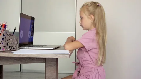Child learns remotely at home Stock Footage 137216551