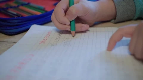 Child learns to write early school Stock Footage 148473264