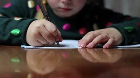 The child learns to write at home, draws a letter. Stock Footage 288581093