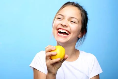 Child with lemon. Stock Photos