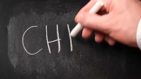 Child lettering on blackboard Stock Footage 220162997