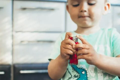 Child with lighter Stock Photos