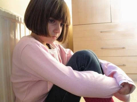 Child looking depressed Stock Photos