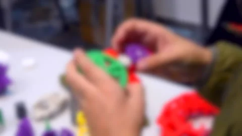 A child is looking into an object printed by 3d printer. Stock Footage 132187888