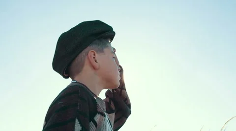 Child looking into the sky Video stock 56690763