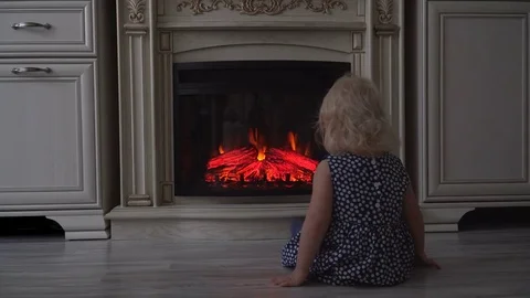 Child looks at fire Stock Footage 72572013