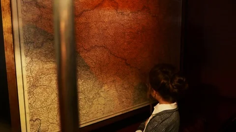 The child looks at the map Stock Footage 99136657