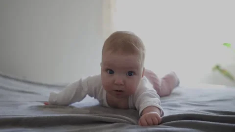 Child lying on the bed. Stock Footage 280306956