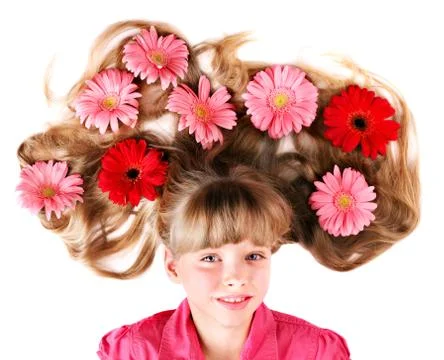 Child lying  on the flowers. 스톡 사진